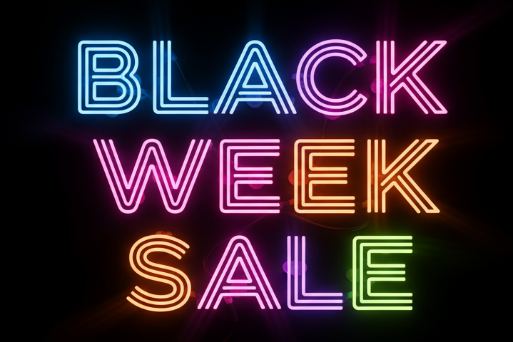 ein schwarzer hintergrund mit neon leuchtbuchstaben BLACK WEEK SALE
